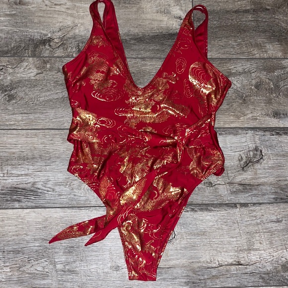 zulily dragon patterned one piece swimsuit - Picture 1 of 3